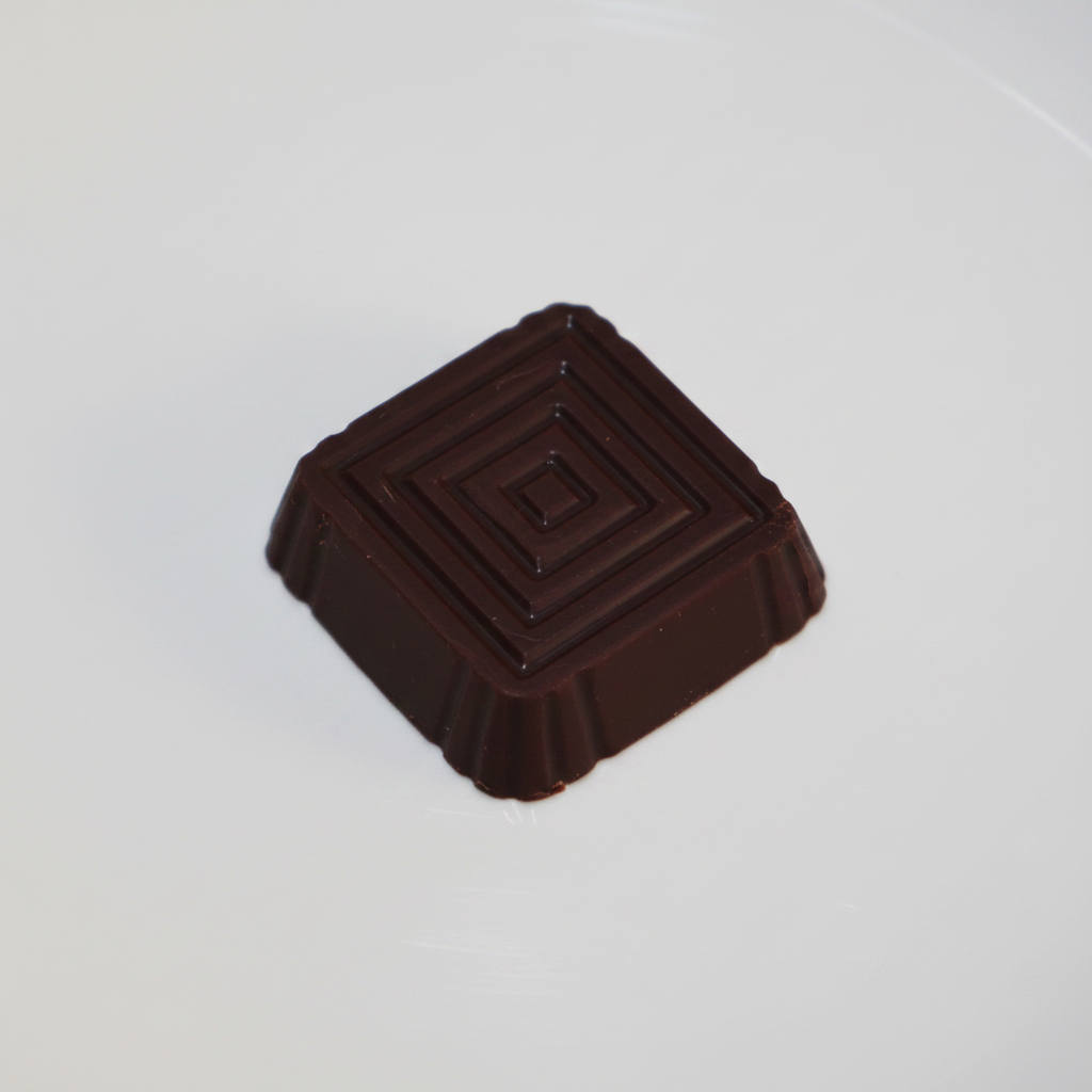 Choc Top Massage Bar on white studio background